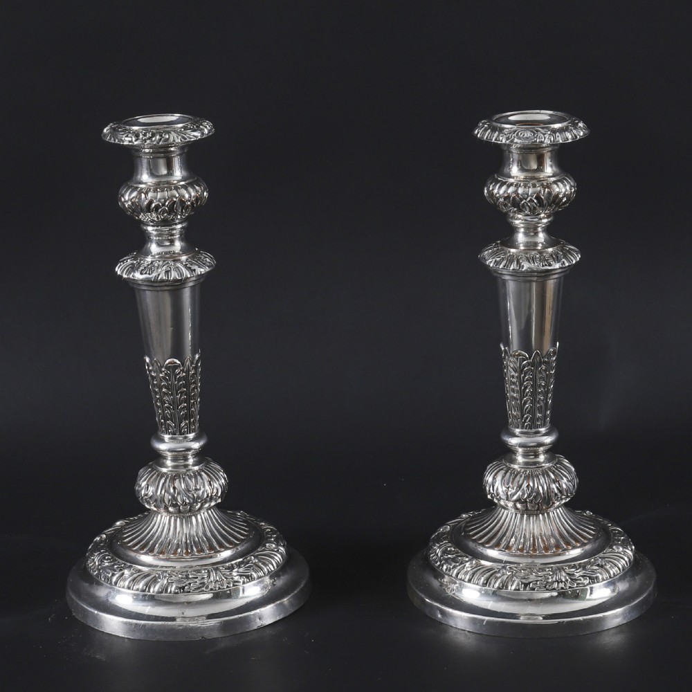 A pair of silver three-light candelabra featuring fluted columns, reeded scrolling branches, and gadrooned rims on circular bases. View III