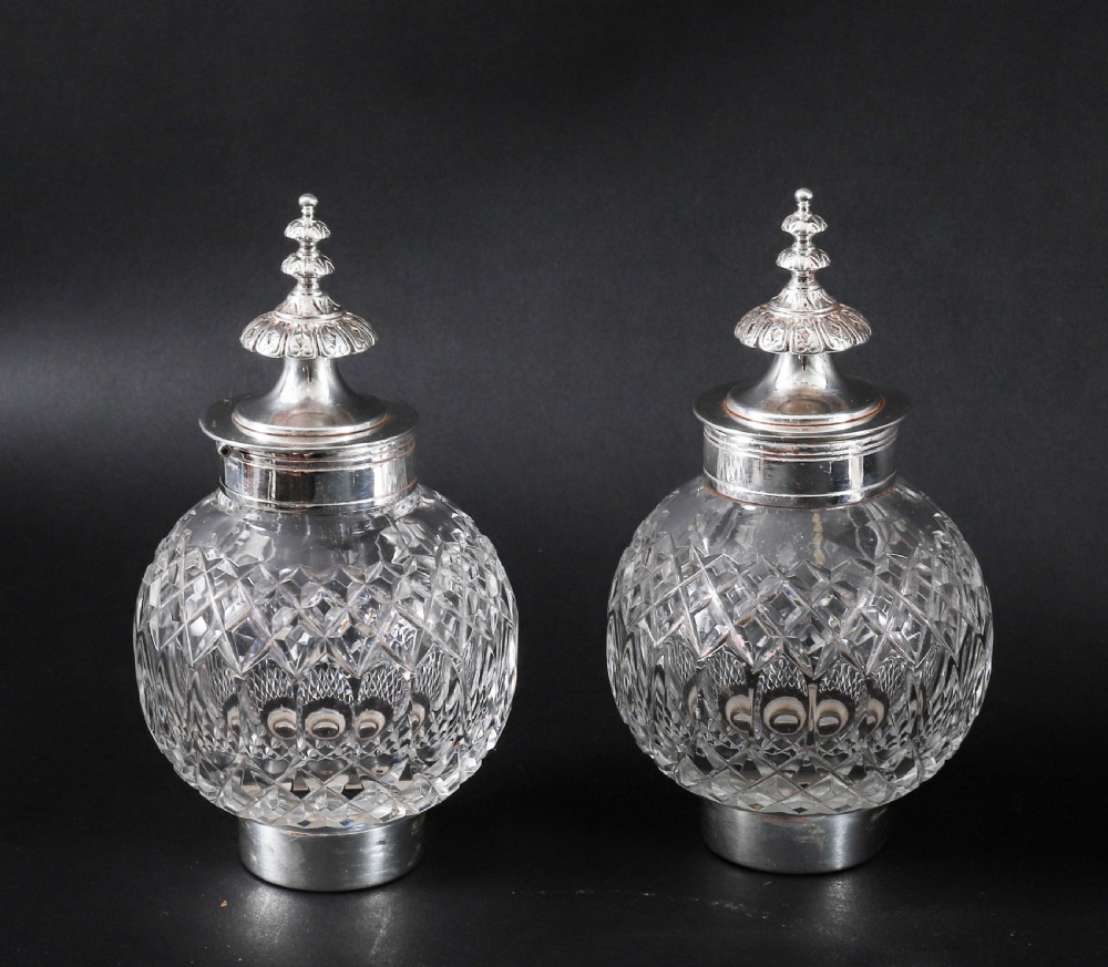 A Victorian silver-plated inkstand featuring a central winged sphinx sculpture flanked by two cut glass inkwell bottles. View XVI