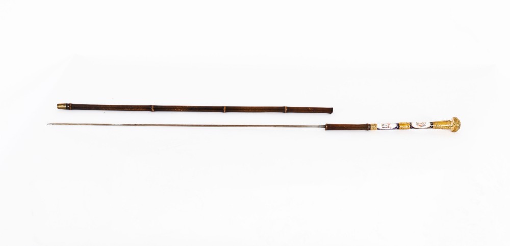 A 19th-century French walking stick featuring a dark wood shaft and a gold-plated pommel adorned with painted porcelain inserts. View III