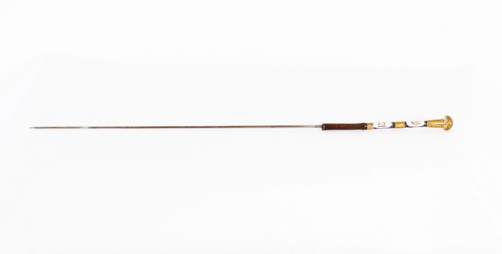 A 19th-century French walking stick featuring a dark wood shaft and a gold-plated pommel adorned with painted porcelain inserts. View IV
