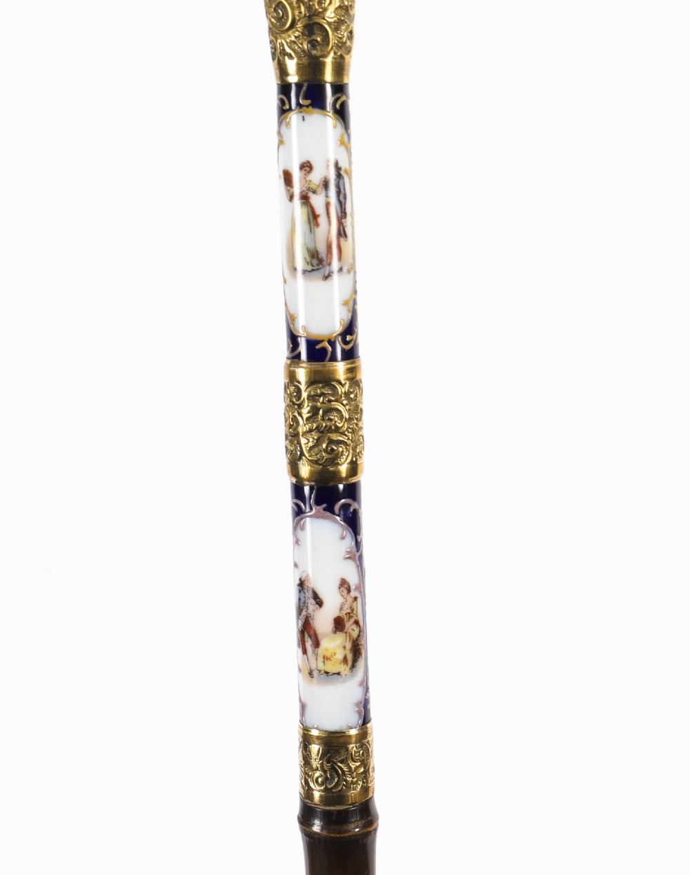 A 19th-century French walking stick featuring a dark wood shaft and a gold-plated pommel adorned with painted porcelain inserts. View VIII