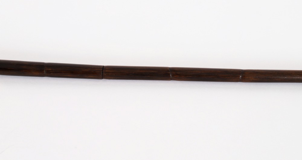 A nineteenth-century French walking stick featuring a dark wood shaft, a gilt metal band, and a hand-painted porcelain pommel handle. View VI