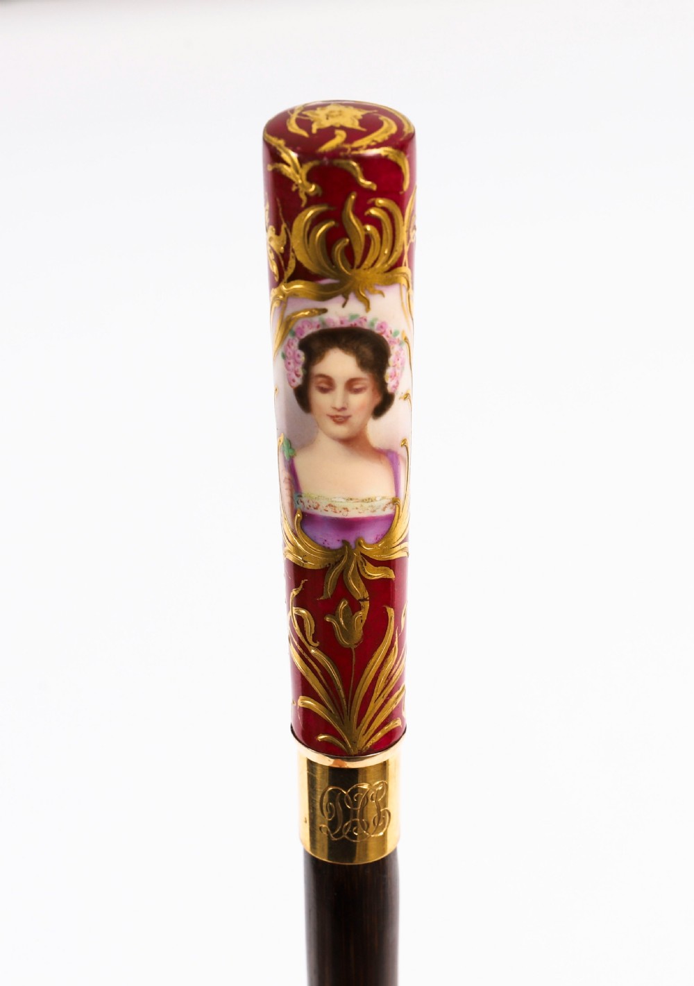 A nineteenth-century French walking stick featuring a dark wood shaft, a gilt metal band, and a hand-painted porcelain pommel handle. View VIII