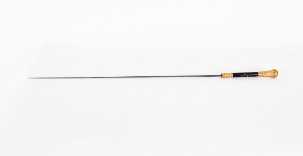 A nineteenth-century French walking cane featuring a dark wooden shaft, a concealed steel blade, and a gilt metal handle mounted with painted Sevres porcelain. View IX