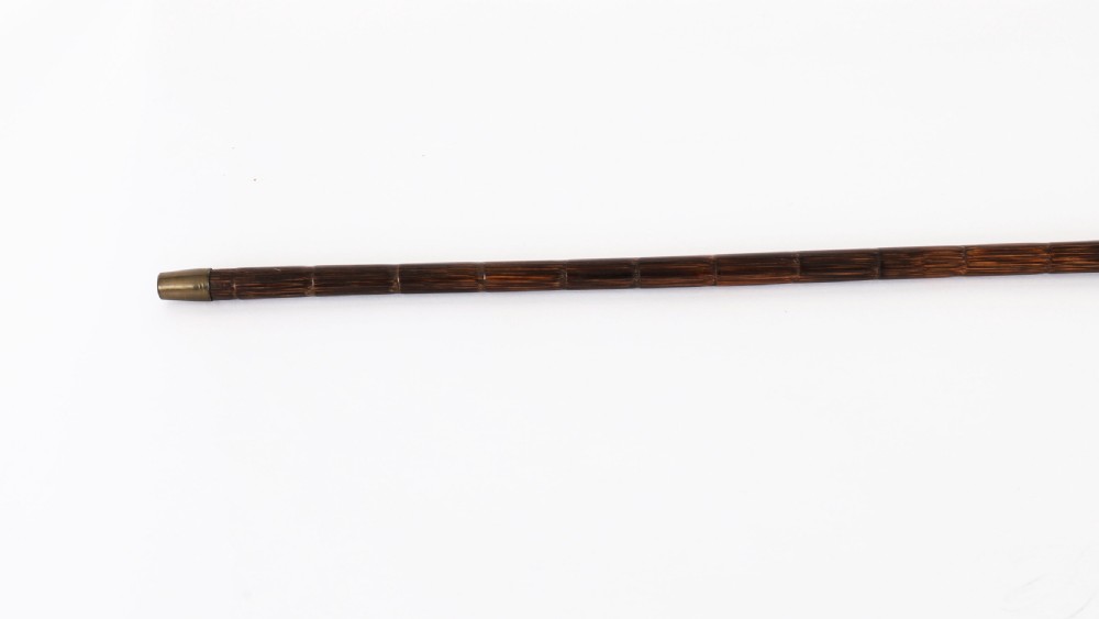 A nineteenth-century French walking cane featuring a dark wooden shaft, a concealed steel blade, and a gilt metal handle mounted with painted Sevres porcelain. View XI