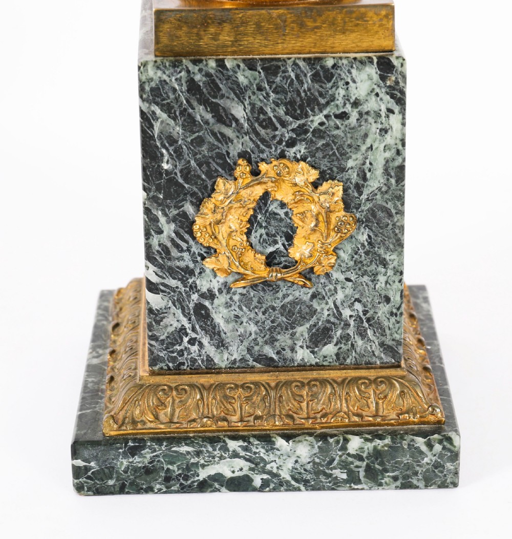 A pair of 19th-century French Grand Tour gilt bronze campana urns featuring classical figure reliefs, mounted on square green marble pedestal bases with gilt laurel wreaths. View XVIII