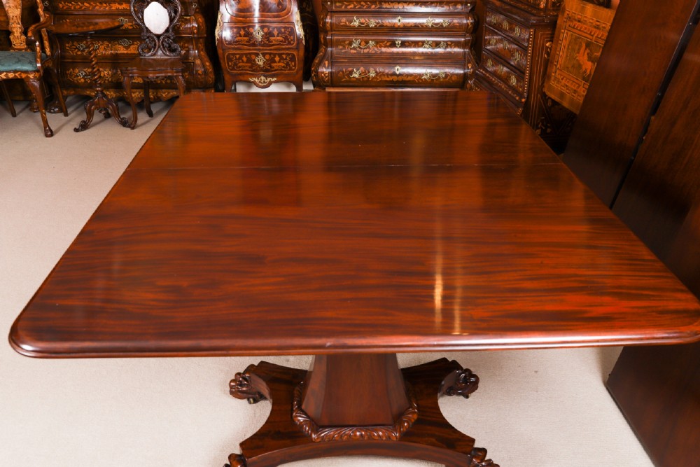An extendable George IV Regency mahogany twin pedestal dining table with carved paw feet. View XIII