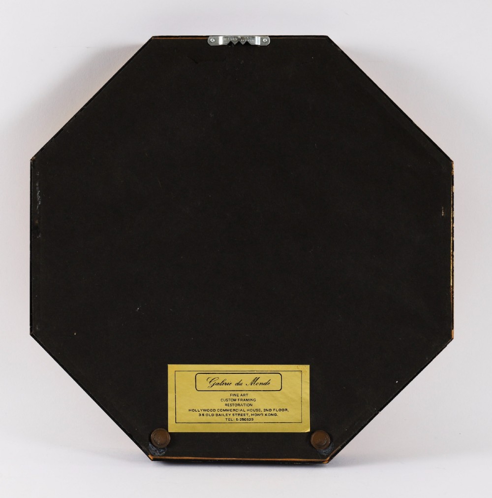 A pair of octagonal giltwood framed wall displays featuring multiple cream plaster intaglio impressions mounted against a dark brown background. View XIV