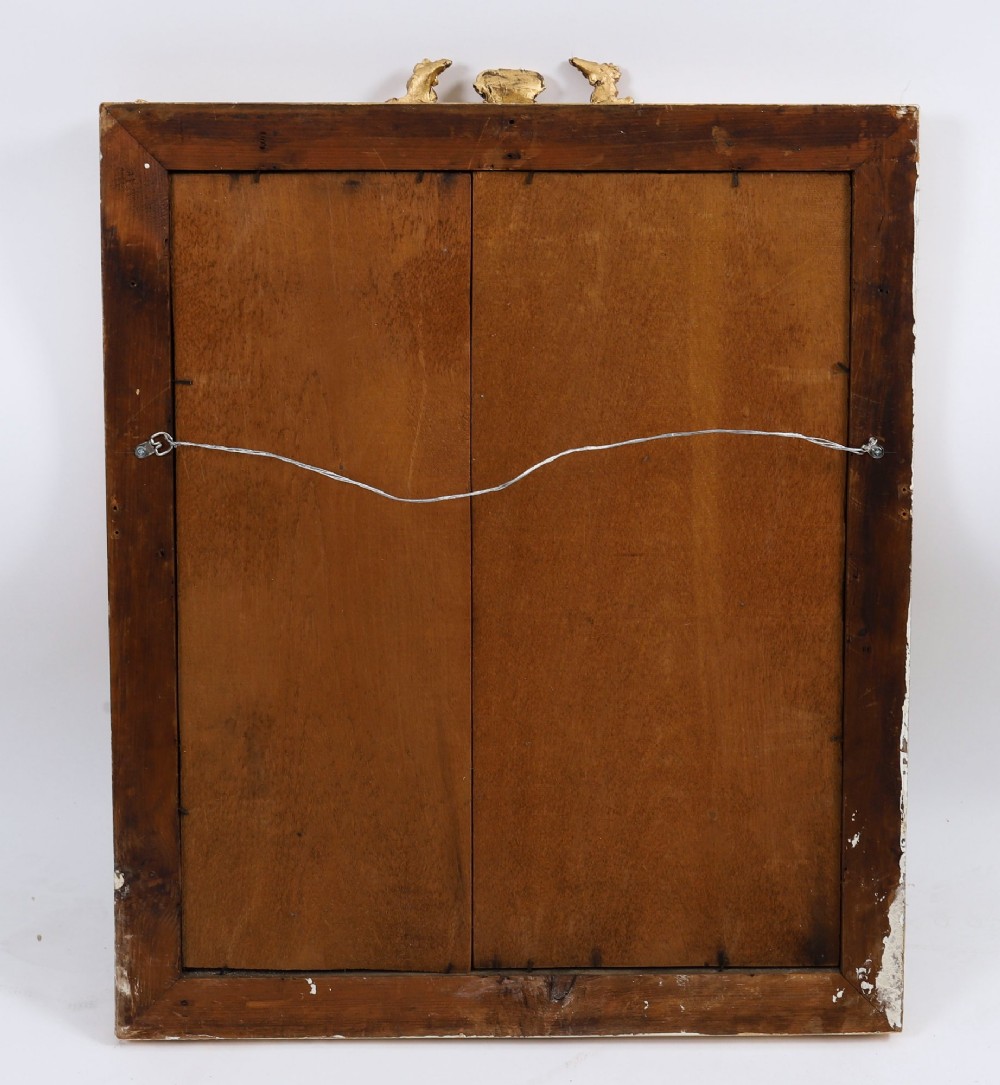 A rectangular nineteenth-century gold giltwood mirror featuring carved Masonic emblems, floral mouldings, and a crest. View IX