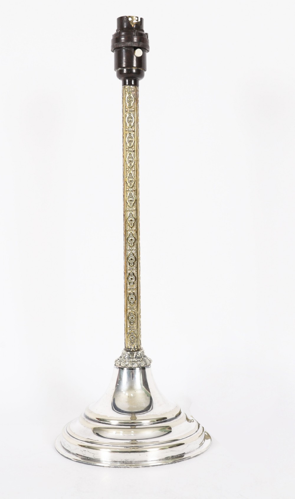 A nineteenth-century silver-plated table lamp base with a parcel gilt patterned column and stepped circular foot.