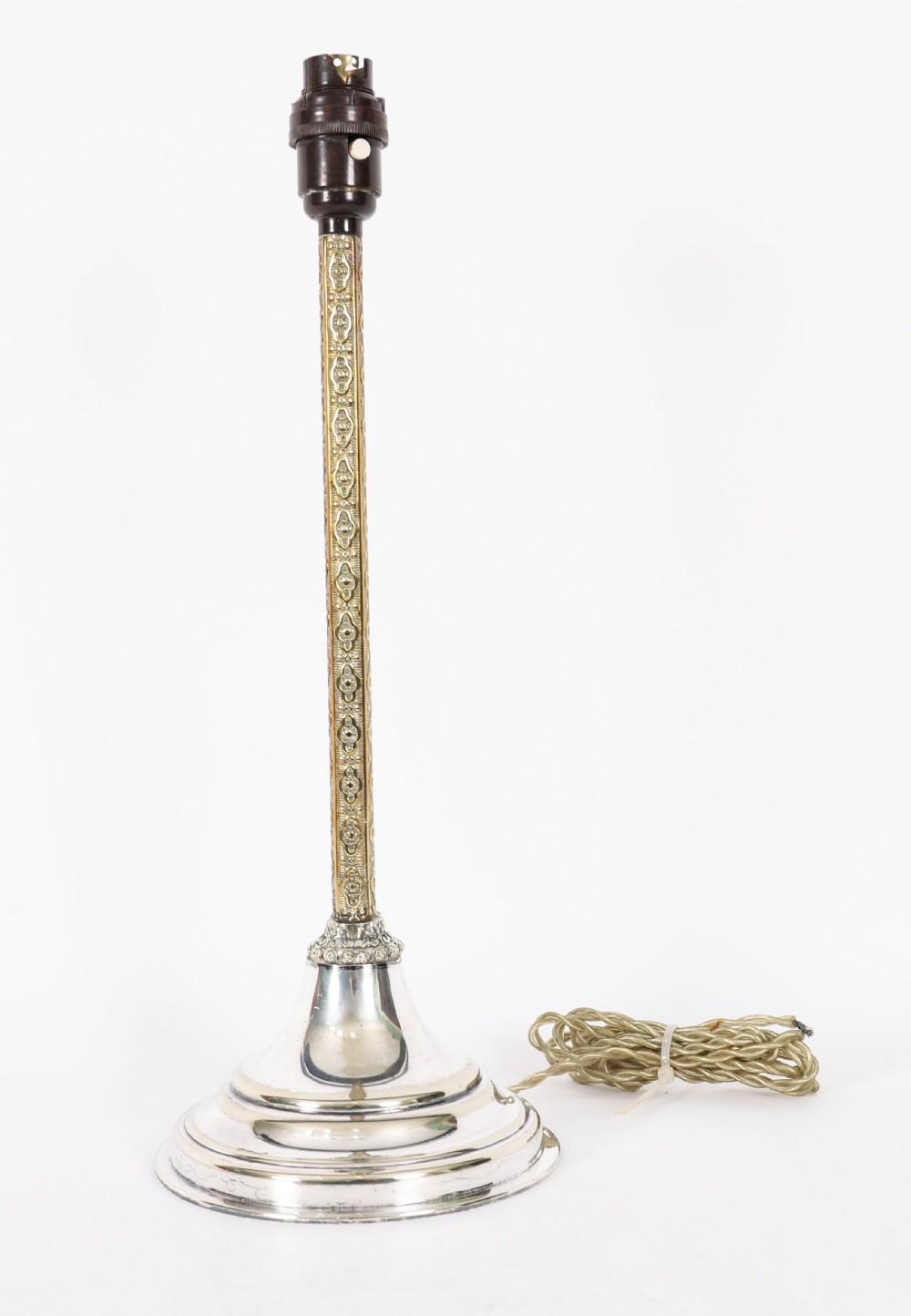 A nineteenth-century silver-plated table lamp base with a parcel gilt patterned column and stepped circular foot. View IX