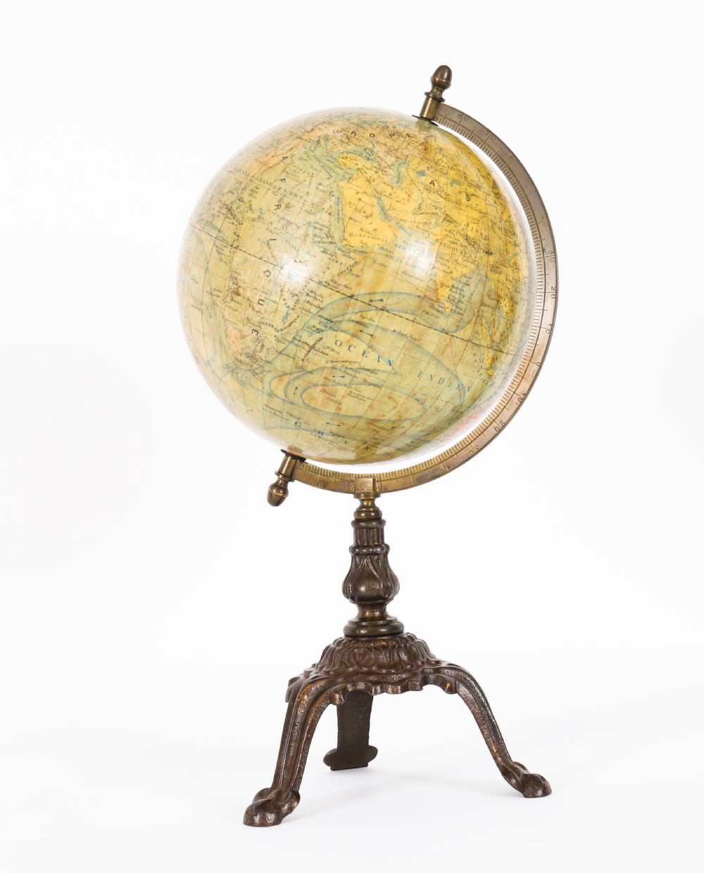 An antique 1880 French terrestrial globe mounted on a brass half-meridian ring and a decorative cast metal tripod base. View V