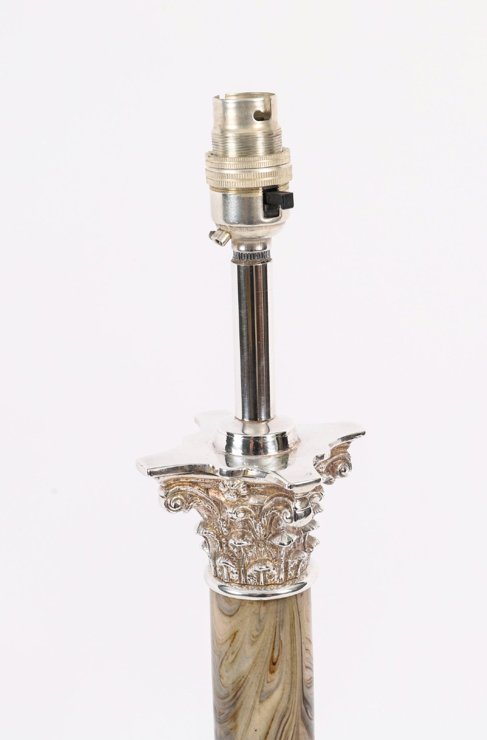 A silver-plated Corinthian column table lamp with a marbled shaft set upon a stepped square base. View IV
