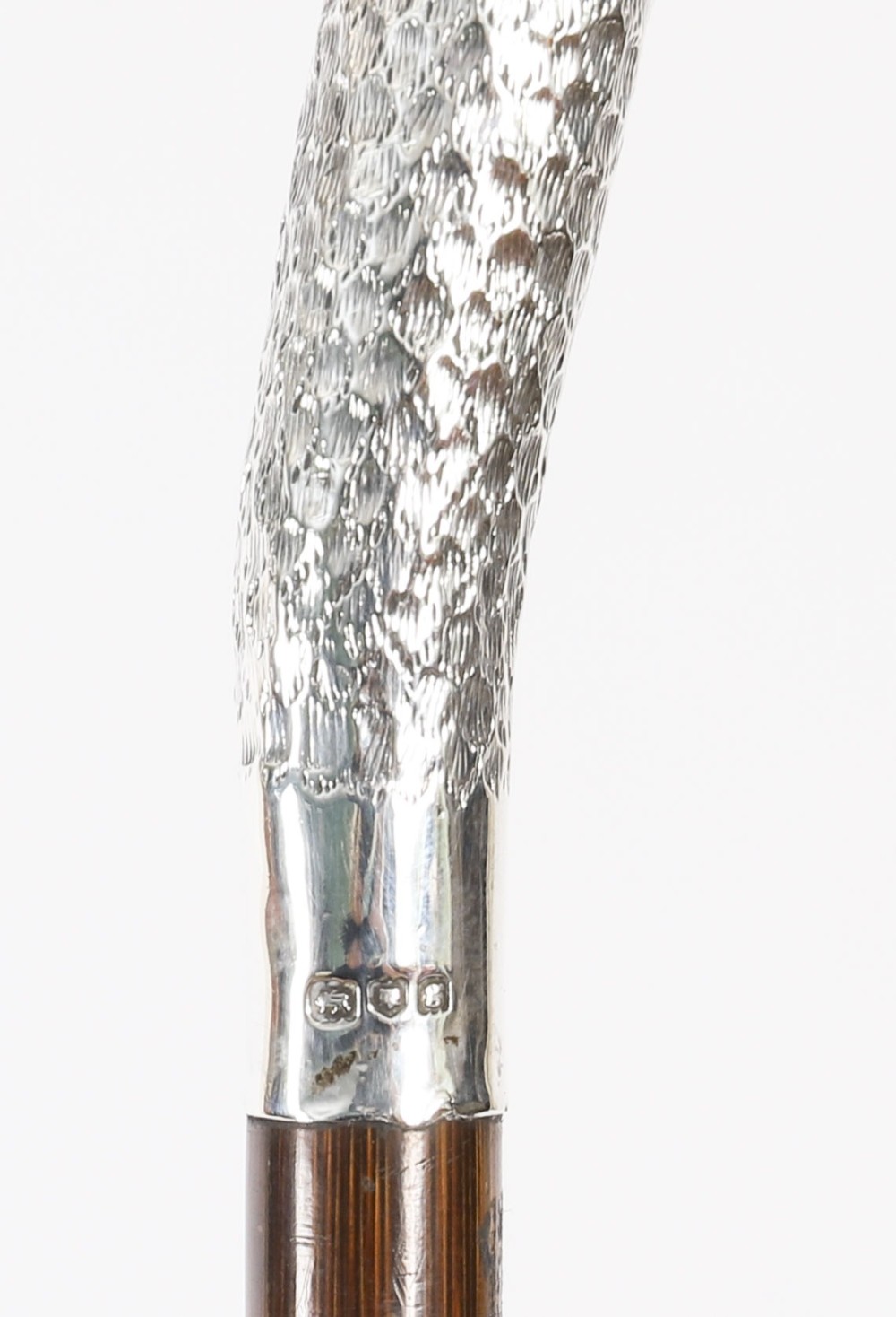 An Edwardian walking stick featuring a sterling silver swan head handle mounted on a dark wood shaft. View VIII
