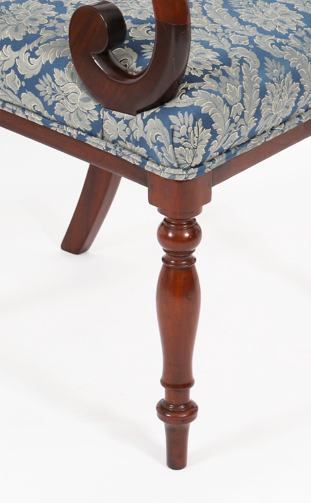 A set of eight William IV mahogany barback dining chairs with blue damask patterned fabric upholstery and turned front legs. View VI