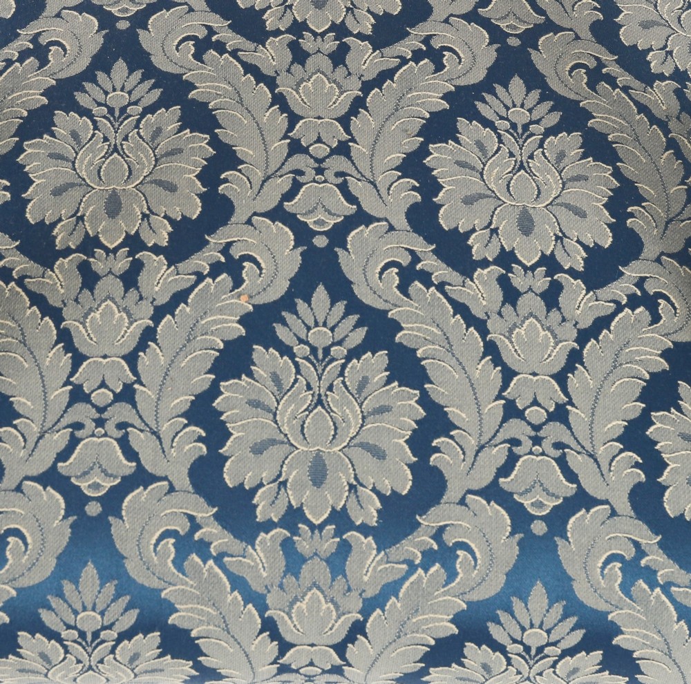 A set of eight William IV mahogany barback dining chairs with blue damask patterned fabric upholstery and turned front legs. View VII