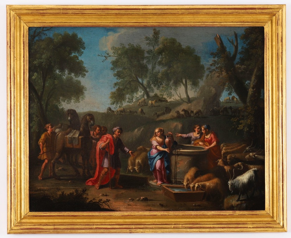 A 17th-century Italian oil painting on board depicting figures and livestock gathered at a well, set within a landscape and surrounded by a moulded gold frame.