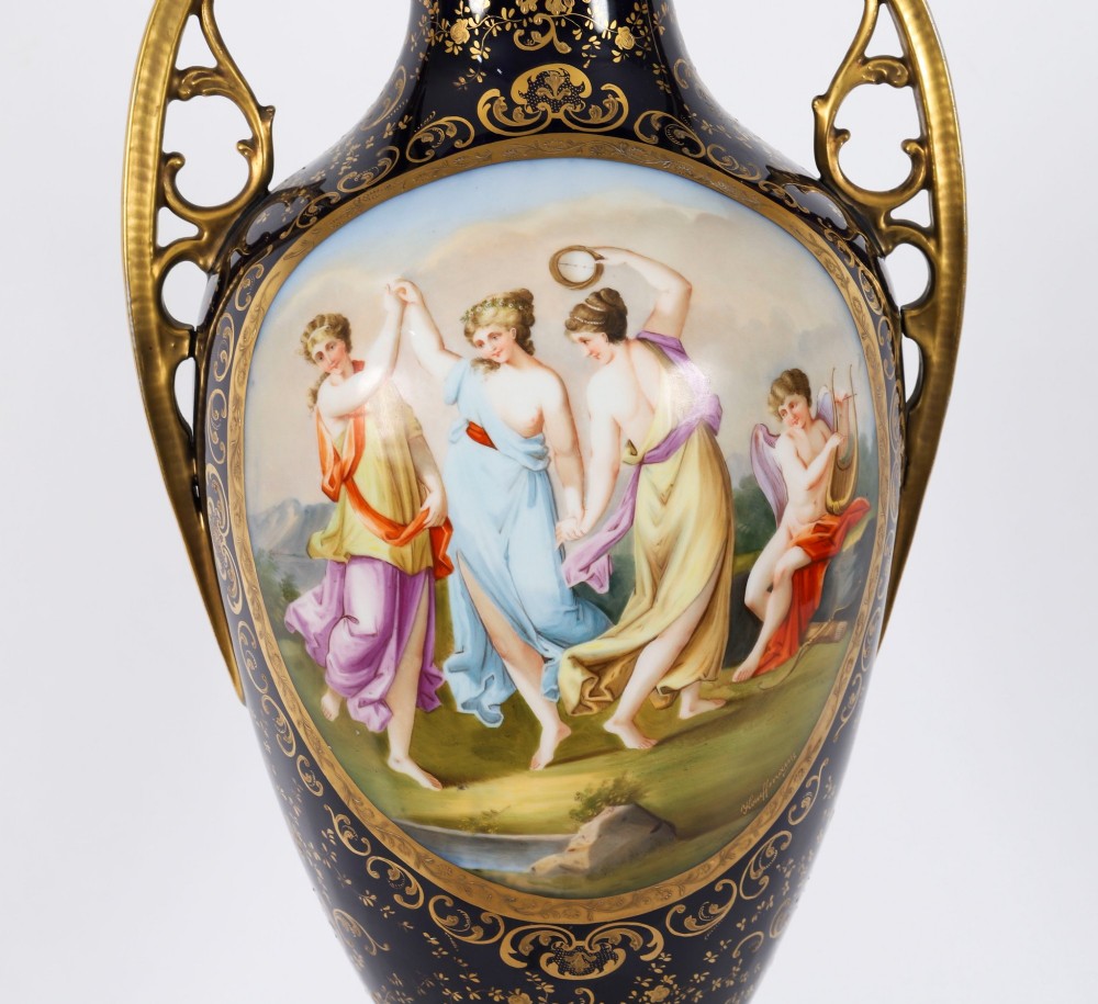 A pair of large 19th-century cobalt blue porcelain vases on matching square pedestals, featuring gilt scrollwork and hand-painted classical mythological scenes. View XIII