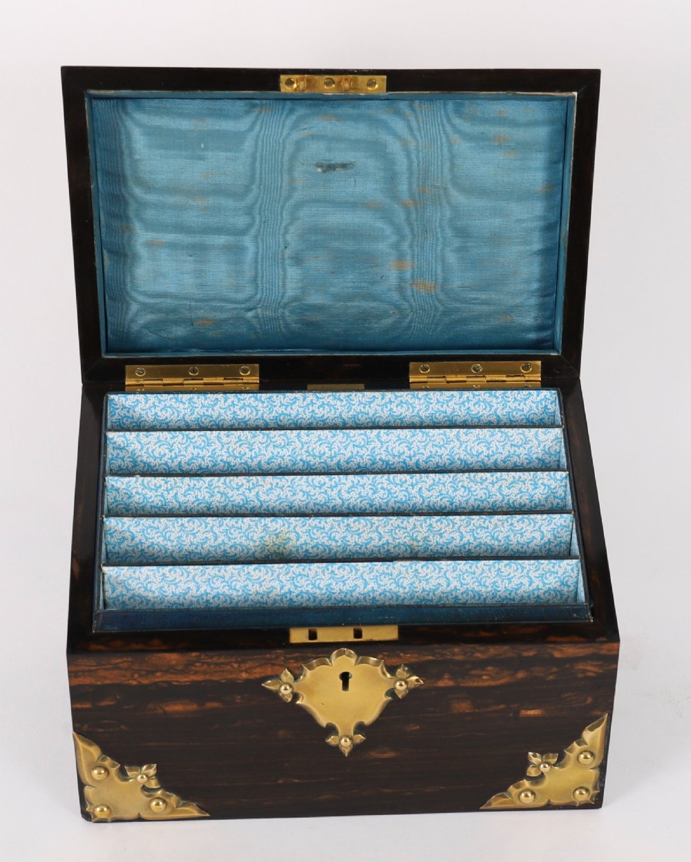 A three-piece Victorian coromandel wood desk set featuring gilt ormolu mounts, brass strapwork, and light blue oval jasperware plaques. View V