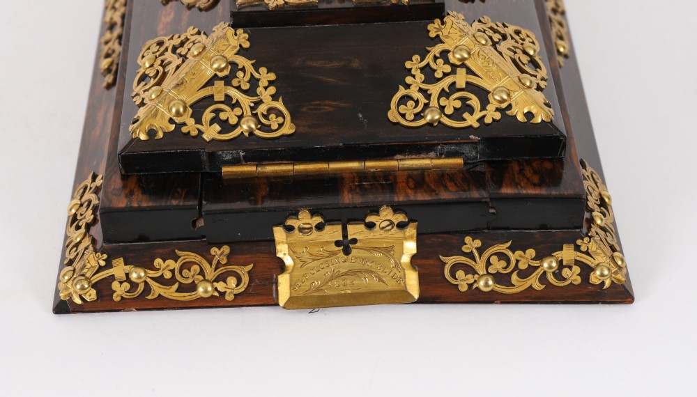 A three-piece Victorian coromandel wood desk set featuring gilt ormolu mounts, brass strapwork, and light blue oval jasperware plaques. View XV