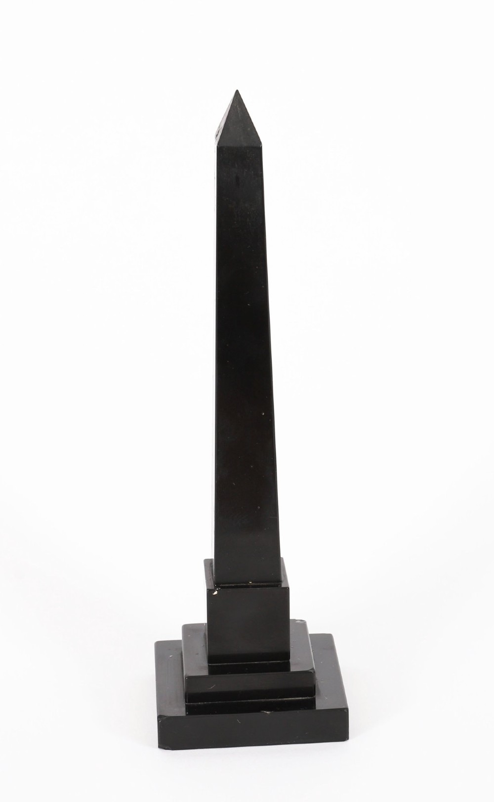 A pair of antique black marble obelisks featuring colourful geometric stone inlays along the shaft and floral inlaid detail on stepped square bases. View XIII