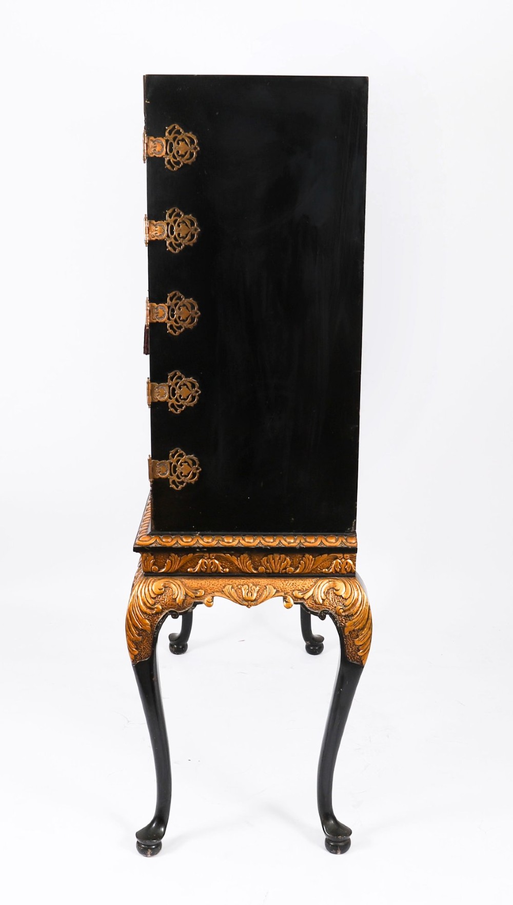 A black lacquered and inlaid wooden cocktail cabinet featuring ornate floral marquetry and decorative brass straps, resting on a carved gilded stand with cabriole legs. View XIII