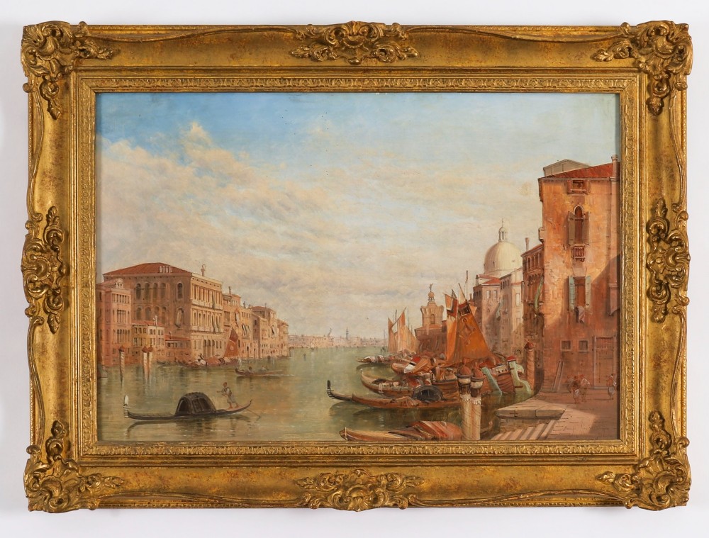 A nineteenth-century framed oil painting depicting gondolas and boats along the Grand Canal in Venice, housed within an ornate gilded frame.