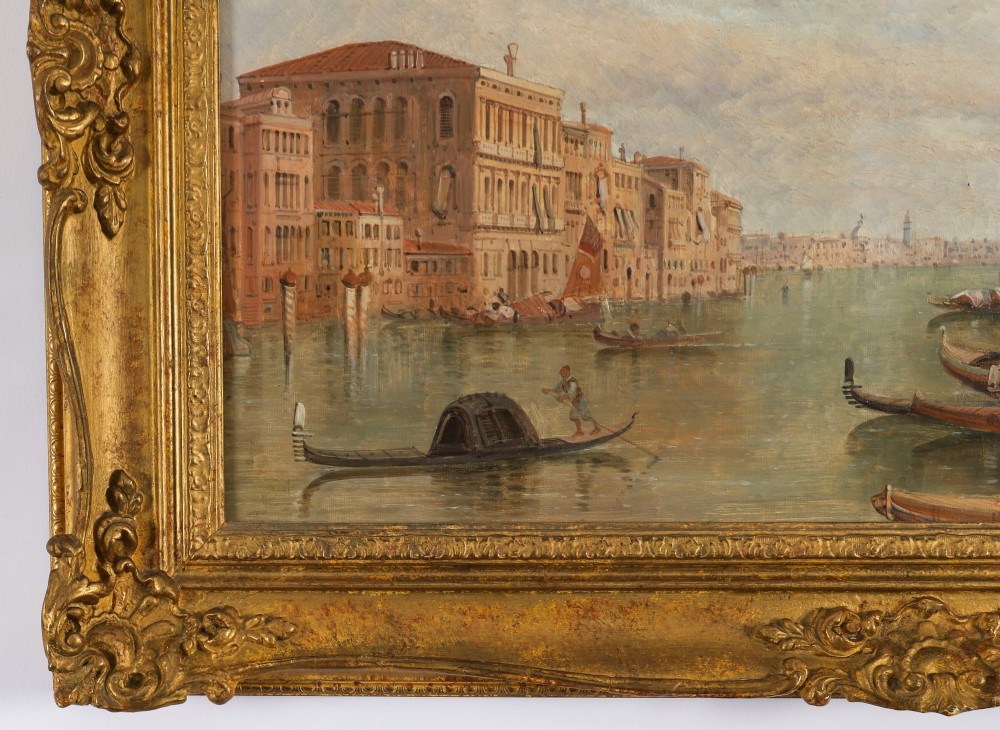 A nineteenth-century framed oil painting depicting gondolas and boats along the Grand Canal in Venice, housed within an ornate gilded frame. View VII