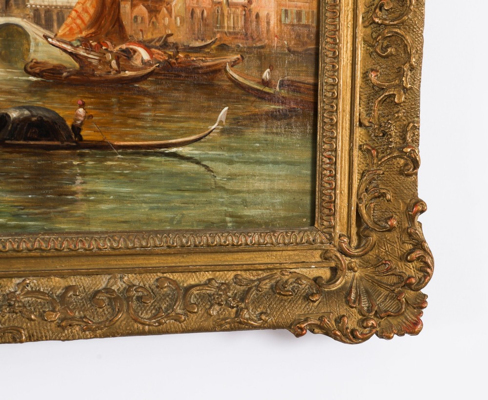 A 19th-century oil painting on canvas depicting a Venetian canal with gondolas and historical architecture, encased in a thick gilt frame. View IX