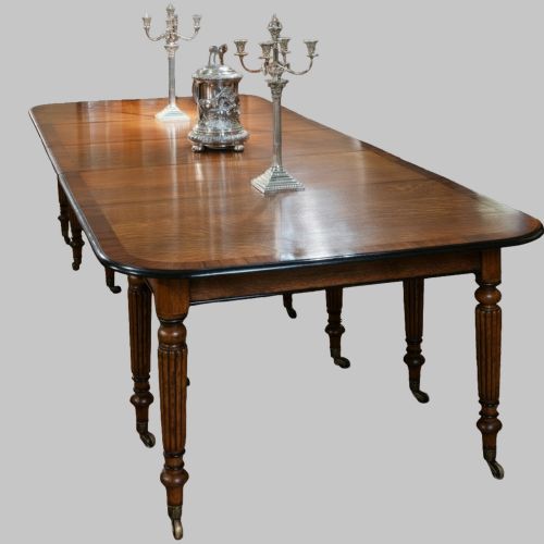 REGENCY OAK EXTENDING DINING TABLE