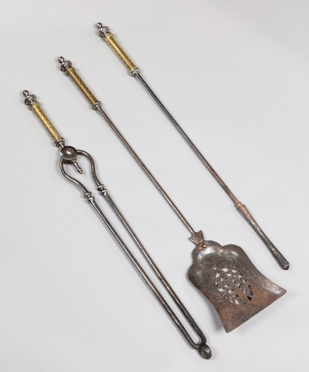 Nineteenth Century set of brass and steel fire irons.
