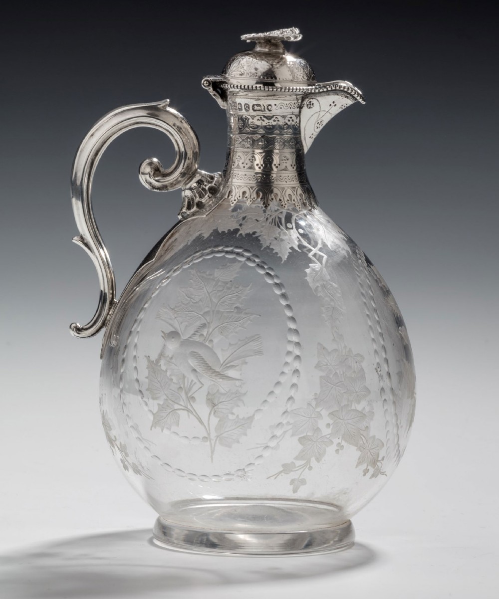 Claret Jug in silver and glass by W. and G. Sissons.