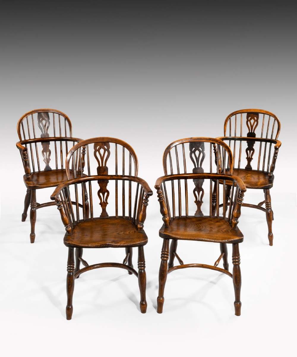 Set of four Nineteenth Century yewwod and elm Windsor armchairs