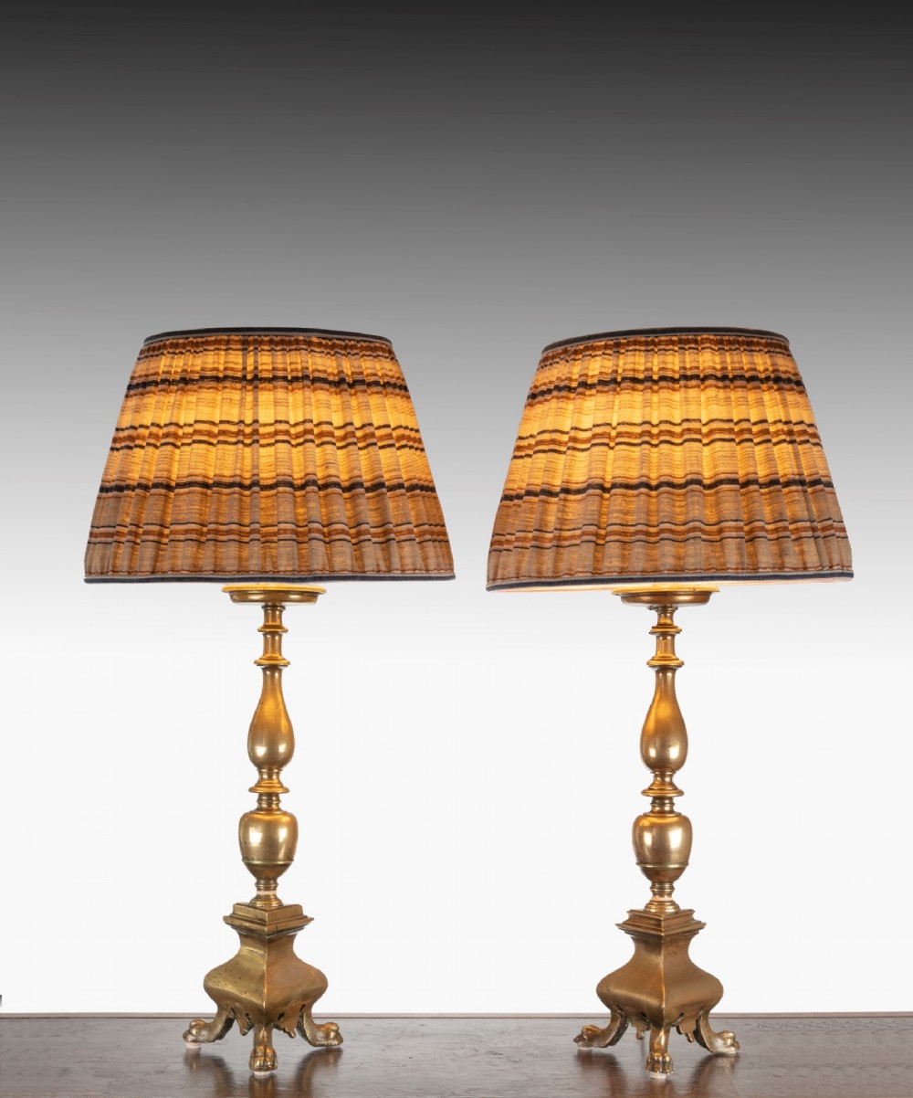 Pair of late Seventeenth Century brass candlesticks converted into lamps