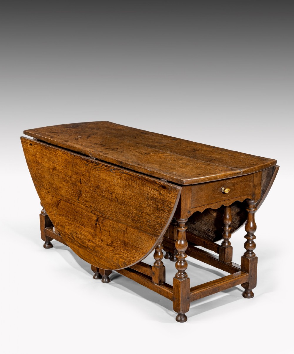 Large Georgian oak gateleg dining table