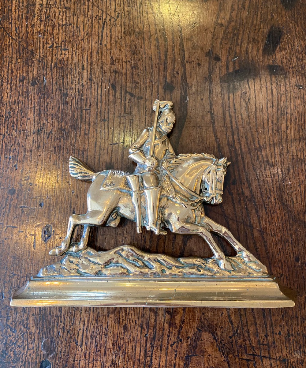 Pair of antique brass cavalryman chimney ornaments