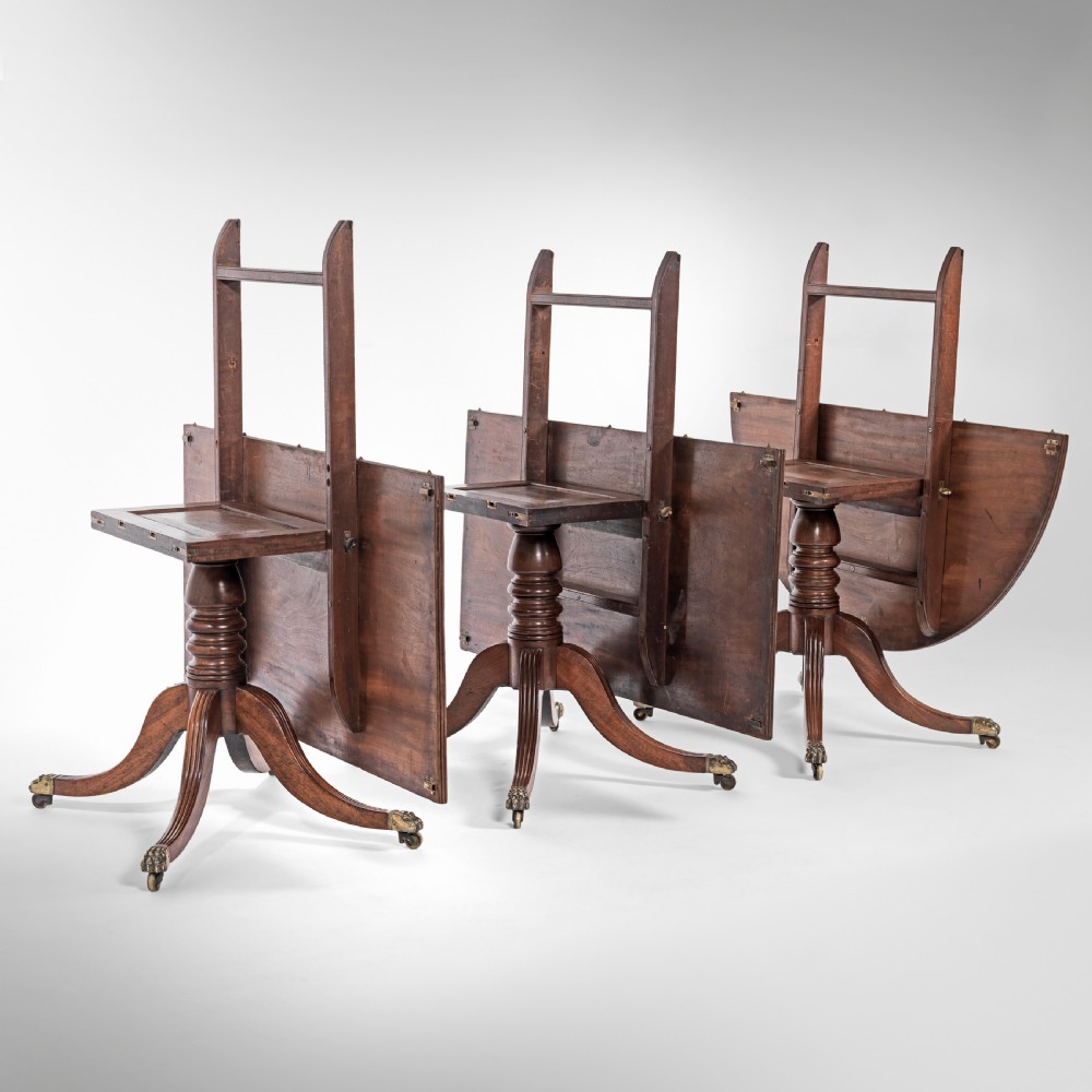 Large Georgian three pillar mahogany dining table View III