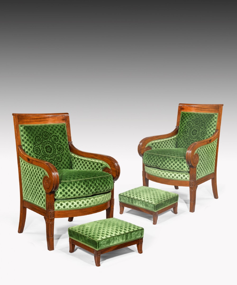 Pair of French Empire mahogany bergere armchairs