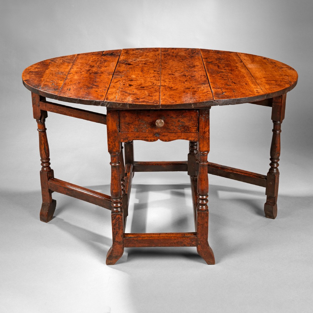 Queen Anne period yew wood gate leg table