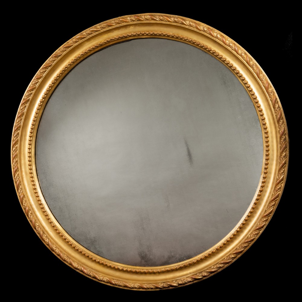 Large Nineteenth Century round giltwood mirror