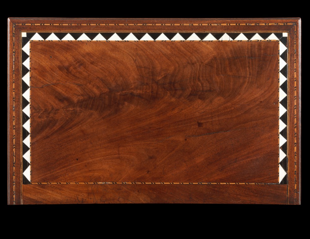 A mid-18th century Chippendale mahogany collectors cabinet on stand featuring diamond bone inlays, delicate line decoration, and two panelled doors. View XII