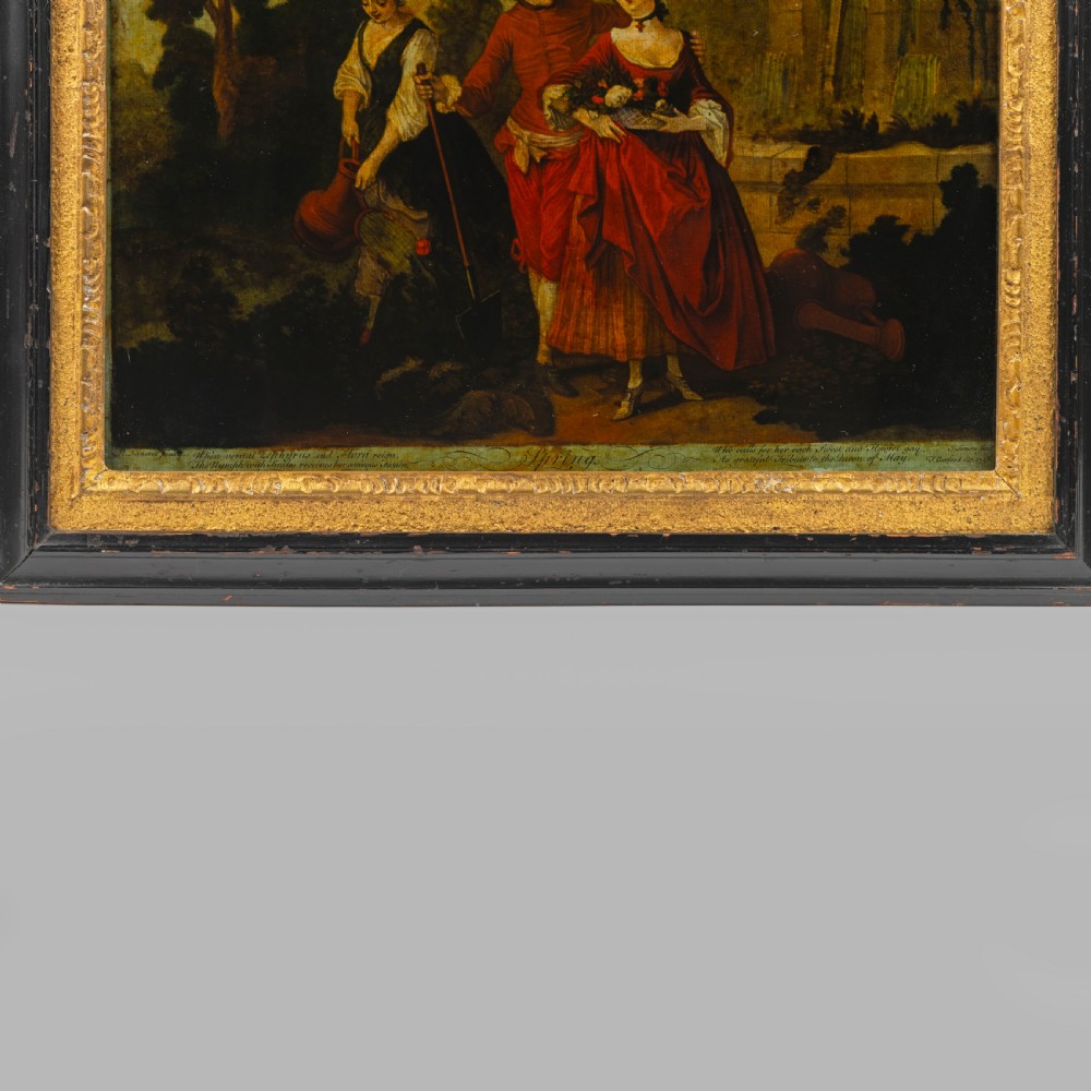 An 18th-century Georgian reverse glass print entitled Spring, depicting three figures in a garden within a black frame and gilded slip. View II