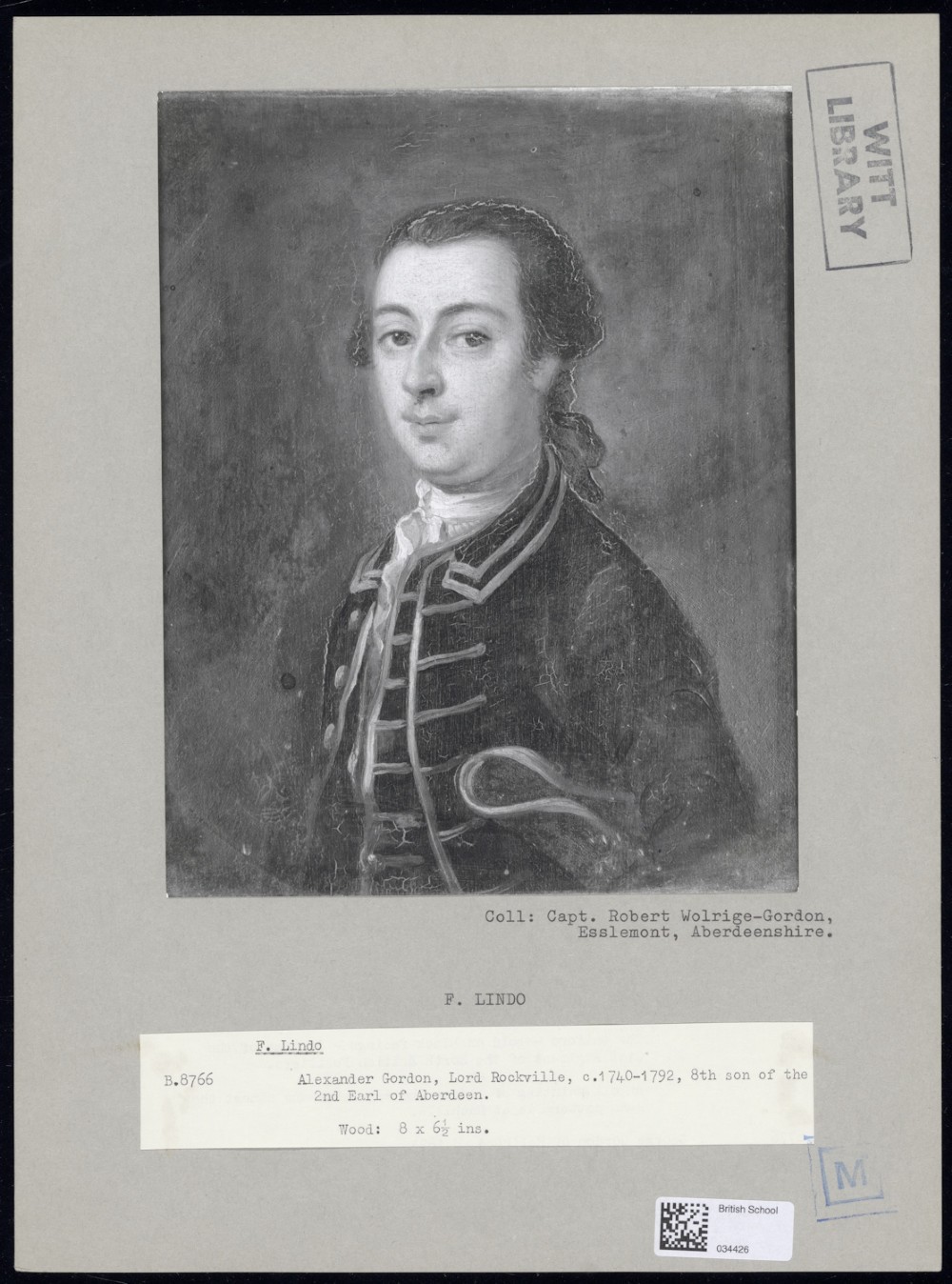 An 18th-century oil portrait depicting a gentleman in a blue military coat trimmed with gold braid, presented in a wide gilt frame. View VII
