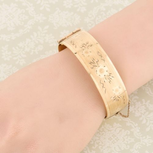 VINTAGE 9CT ROLLED GOLD FLORAL ENGRAVED BANGLE - ADDITIONAL PHOTO 1