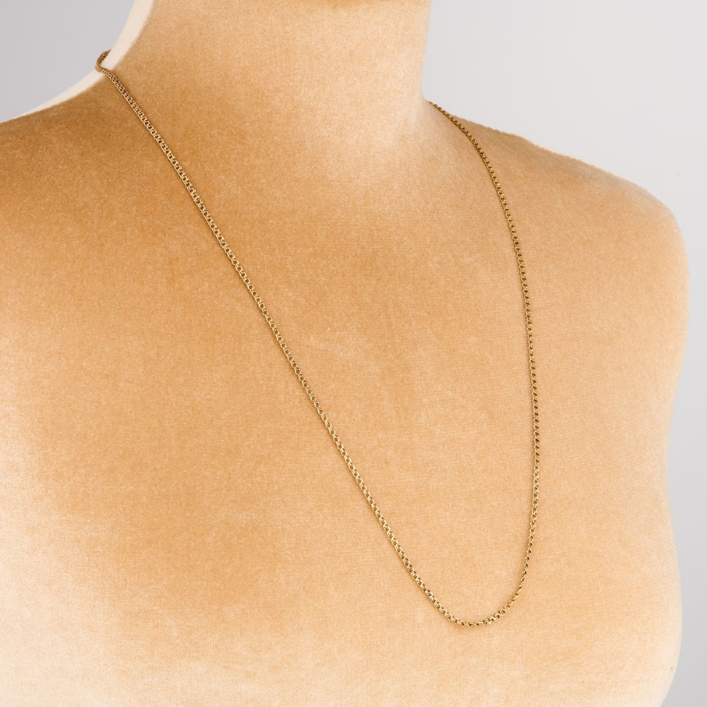 A close-up view of a 9ct gold double belcher chain necklace draped against a white background. View II