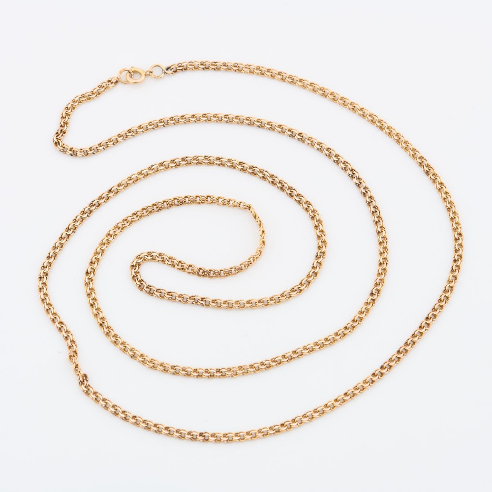 A close-up view of a 9ct gold double belcher chain necklace draped against a white background. View III