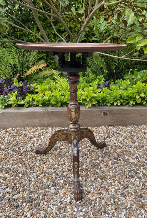 fig 1. An Anglo-Indian tripod side table featuring an oval tray top supported by an intricately lacquered turned column and three cabriole legs.