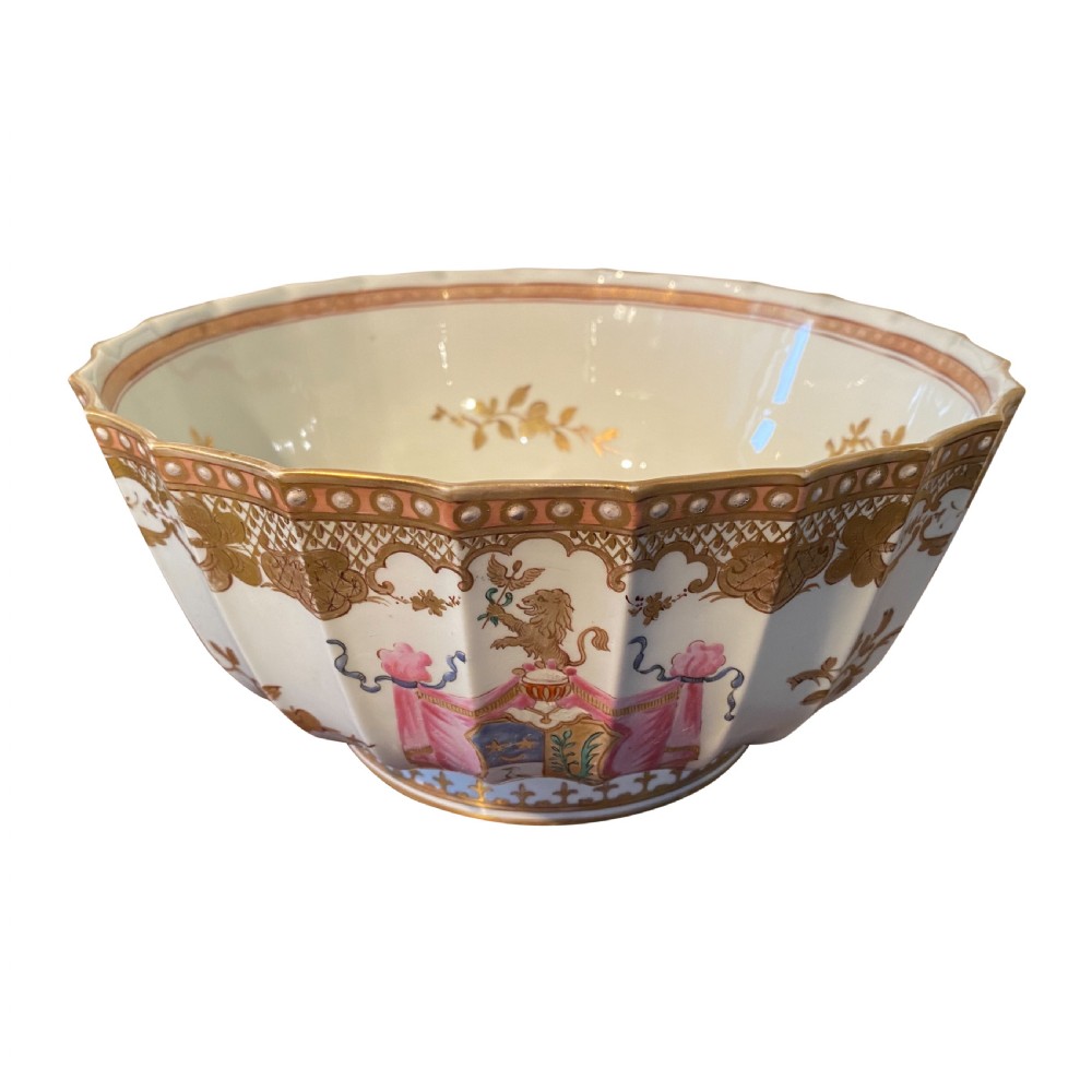 A nineteenth-century fluted porcelain bowl by Samson of Paris featuring hand-painted armorial heraldry, pink draping, and intricate gilded borders.