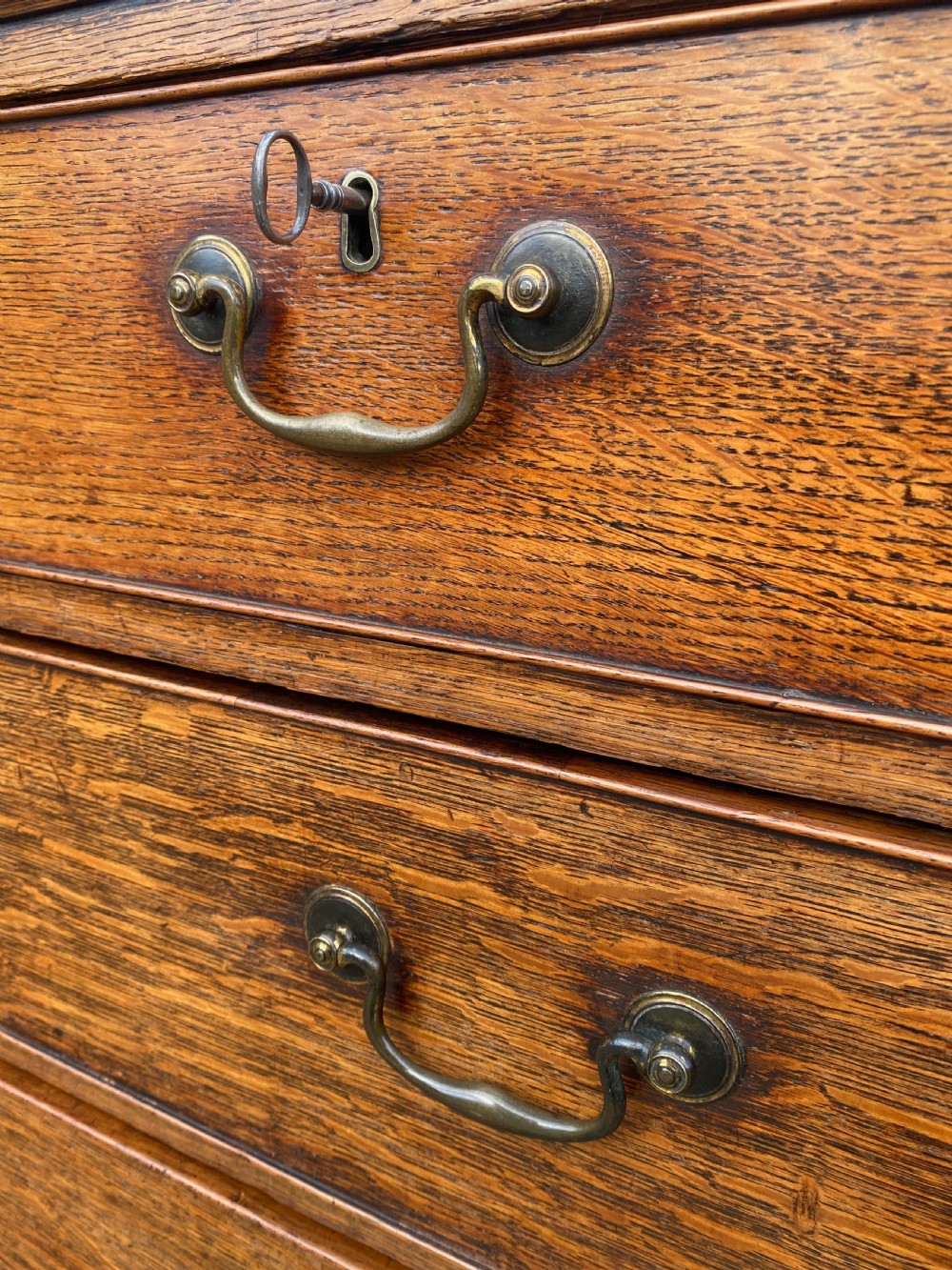 George III Solid Oak Chest Of Drawers With Original Swan Neck Handles View IV