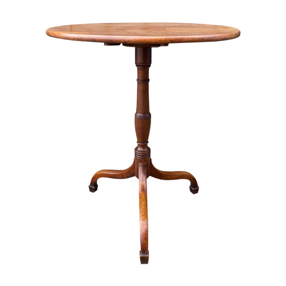 An overhead view of a round George III solid mahogany tilt-top occasional table on a tripod base. View II